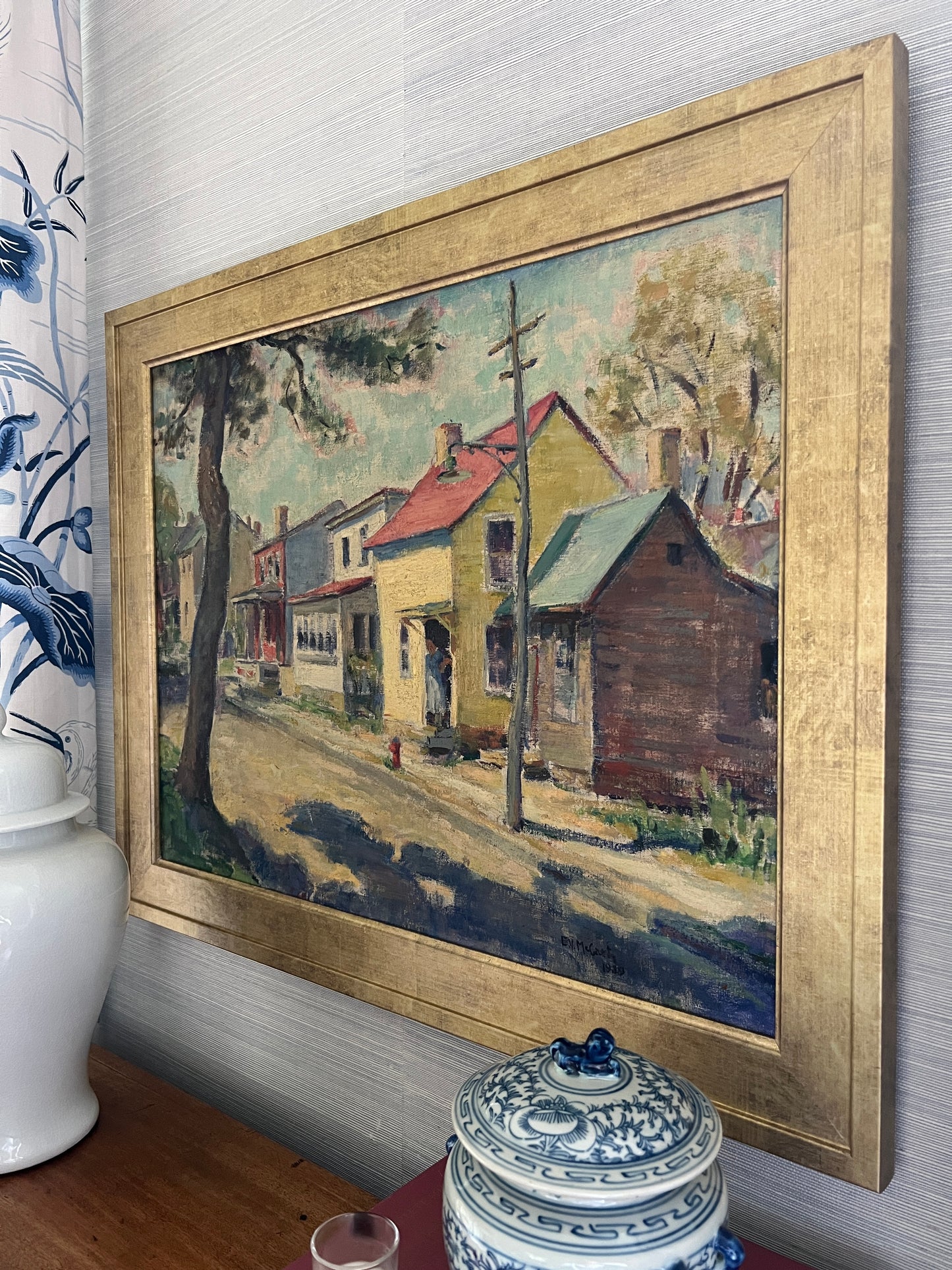 1939 E.V. McCarty Colorful Small Town Oil Painting in Gold Frame