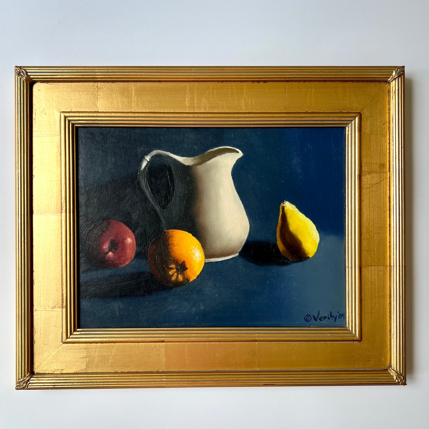 Contemporary Navy Still Life of Apple, Orange, Pear and White Pitcher in Gold Frame