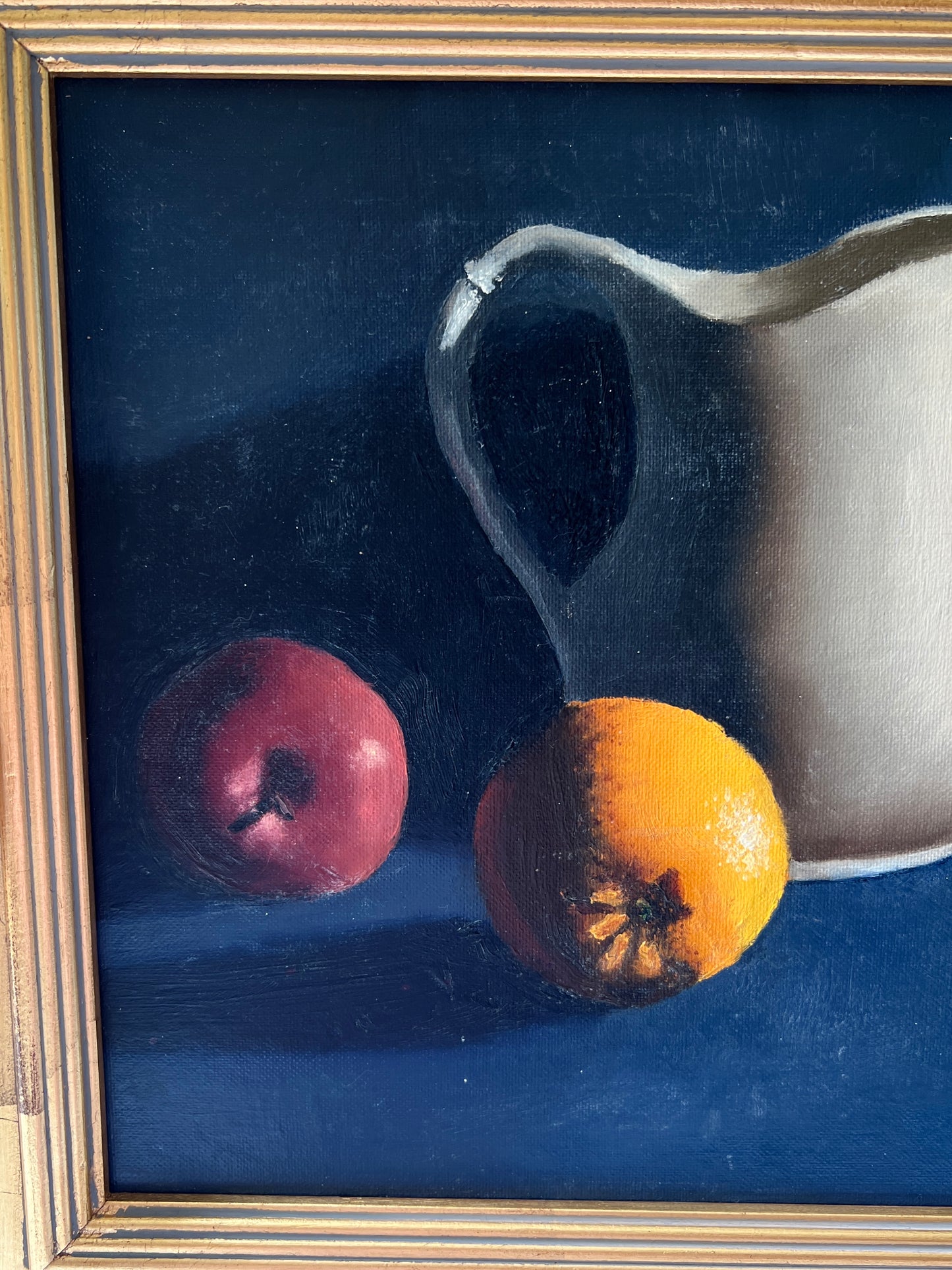 Contemporary Navy Still Life of Apple, Orange, Pear and White Pitcher in Gold Frame